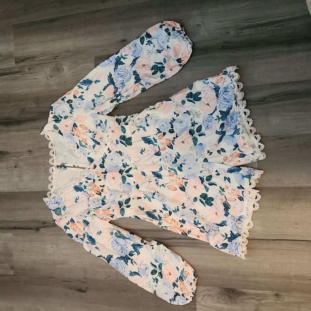 Long-sleeved floral romper